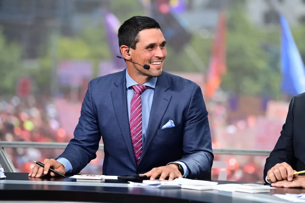 David Pollack on an ESPN show smiling